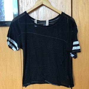 XS black t-shirt with white striped shoulders.